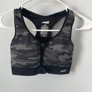 AVIA Zip Up Sports Bra. 57% Nylon, 37% Polyester, 6% Spandex